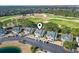 Aerial view of condos, a pond and golf course, showcasing the community's beautiful surroundings at 1081 Blue Stem Dr. # 35-B, Pawleys Island, SC 29585