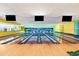 Full bowling alley with colorful décor and overhead scoring monitors at 1105 S Ocean Blvd. # 1004, Myrtle Beach, SC 29577