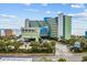 Lovely exterior of the Coral Beach Resort with lush landscaping and ample parking at 1105 S Ocean Blvd. # 1004, Myrtle Beach, SC 29577