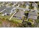 Aerial view of a well-maintained home with a fenced backyard, surrounded by lush landscaping and neighboring houses at 1108 Inlet View Dr., North Myrtle Beach, SC 29582