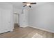 Bedroom featuring wood-look flooring, white walls, and entry to the closet at 1108 Inlet View Dr., North Myrtle Beach, SC 29582