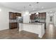 Well-lit kitchen featuring granite counters, stainless steel appliances, and a central island at 1108 Inlet View Dr., North Myrtle Beach, SC 29582