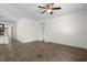 Comfortable living room with wood-look tile, seamlessly connected to the kitchen and dining areas at 1108 Inlet View Dr., North Myrtle Beach, SC 29582