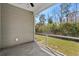 Screened-in patio, showcasing outdoor living with views of the green backyard at 1108 Inlet View Dr., North Myrtle Beach, SC 29582