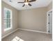 Bedroom featuring neutral walls, a ceiling fan, and plush carpeting, creating a serene retreat at 117 Ella Kinley Circle # 201, Myrtle Beach, SC 29588