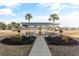 Walkway leading to a gazebo with picnic tables at 117 Ella Kinley Circle # 201, Myrtle Beach, SC 29588