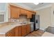 Bright kitchen featuring stainless steel appliances and tile backsplash at 117 Ella Kinley Circle # 201, Myrtle Beach, SC 29588