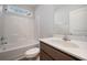 Well-lit bathroom with white tub, shower, and modern vanity at 1239 Cypress Shoal Dr., Conway, SC 29526