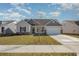 Charming single-Gathering home with a well-manicured lawn and two-car garage at 1239 Cypress Shoal Dr., Conway, SC 29526