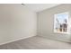 Bedroom showcasing neutral carpet and a window providing ample natural light at 124 Old Chimney Ln, Conway, SC 29526