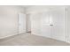 Bedroom featuring neutral carpet and closet with a door to the ensuite at 124 Old Chimney Ln, Conway, SC 29526