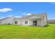 Spacious backyard with a covered patio perfect for outdoor entertaining and relaxation at 124 Old Chimney Ln, Conway, SC 29526