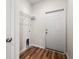 Functional laundry area with shelving, flooring, and utility connections at 124 Old Chimney Ln, Conway, SC 29526