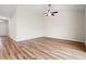 A versatile living room space featuring wood floors and a ceiling fan at 124 Old Chimney Ln, Conway, SC 29526