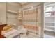 Cozy bathroom featuring a glass bowl sink, neutral colors and a shower-tub combo at 1424 Glenns Bay Rd. # 1424, Myrtle Beach, SC 29575