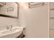 Traditional bathroom featuring a sink vanity, towel racks, and a mirror at 1424 Glenns Bay Rd. # 1424, Myrtle Beach, SC 29575