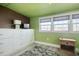 Bedroom space with a large dresser, ample natural light, and contemporary color scheme at 1424 Glenns Bay Rd. # 1424, Myrtle Beach, SC 29575