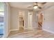 Bedroom featuring a ceiling fan, closet and ensuite bathroom doorways, and plank floors at 1424 Glenns Bay Rd. # 1424, Myrtle Beach, SC 29575