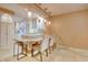 Eat-in kitchen dining area with tile floors and decorative pendant lighting at 1424 Glenns Bay Rd. # 1424, Myrtle Beach, SC 29575