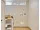 Laundry room featuring tile floor, storage, and upper window at 1424 Glenns Bay Rd. # 1424, Myrtle Beach, SC 29575