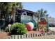 Exterior view of Bubba's Fish Shack, featuring signage, palm trees, and nautical decor at 1424 Glenns Bay Rd. # 1424, Myrtle Beach, SC 29575