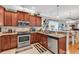 Well-equipped kitchen featuring stainless steel appliances, granite countertops, and ample cabinet space at 1424 Powhaton Dr., Myrtle Beach, SC 29577