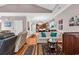 Open-concept living room with hardwood floors connecting to the dining and kitchen areas at 1424 Powhaton Dr., Myrtle Beach, SC 29577