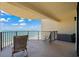 Outdoor balcony with comfortable seating and beautiful views of the ocean at 1425 S Ocean Blvd. # 7C, North Myrtle Beach, SC 29582