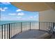 Outdoor balcony with comfortable seating and stunning views of the ocean and beach at 1425 S Ocean Blvd. # 7C, North Myrtle Beach, SC 29582