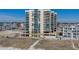 Stunning exterior of a high-rise beachfront condo building featuring balconies with ocean views at 1425 S Ocean Blvd. # 7C, North Myrtle Beach, SC 29582