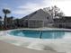 Exterior view of community pool area and cabana, perfect for relaxation and socializing in a convenient setting at 1500 Deer Creek Rd. # C, Surfside Beach, SC 29575