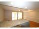 Kitchen island with granite countertop overlooks open living space, great for entertaining at 1500 Deer Creek Rd. # C, Surfside Beach, SC 29575