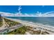 Beautiful aerial view of a white sandy beach featuring sparkling ocean views at 1585 Brookgreen Dr., Myrtle Beach, SC 29577