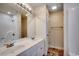 Bathroom with double vanity sink, large mirror and tiled floors at 1585 Brookgreen Dr., Myrtle Beach, SC 29577