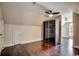 Bedroom with hardwood floors, modern ceiling fan, and built-in wardrobe closet at 1585 Brookgreen Dr., Myrtle Beach, SC 29577