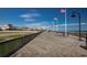 View of a scenic boardwalk featuring ocean views, American flags and a Ferris wheel at 1585 Brookgreen Dr., Myrtle Beach, SC 29577