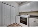 Laundry room featuring white washer, dryer, and white cabinets at 1585 Brookgreen Dr., Myrtle Beach, SC 29577