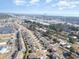 A neighborhood aerial view shows a community near the coast, with shopping areas and manicured lawns at 160 Ocean Commons Dr., Surfside Beach, SC 29575