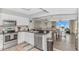 Modern kitchen with stainless steel appliances, granite countertops, and open access to living spaces at 1625 S Ocean Blvd. # 1810, North Myrtle Beach, SC 29582