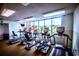 An interior gym with a range of exercise machines and a large window at 1625 S Ocean Blvd. S # 910, North Myrtle Beach, SC 29582