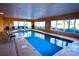 An indoor pool surrounded by many windows letting in a good amount of natural light at 1625 S Ocean Blvd. S # 910, North Myrtle Beach, SC 29582