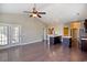 Spacious living room with hardwood floors, recessed lighting, ceiling fan, and access to the outside at 179-A Parmelee Dr. # A, Murrells Inlet, SC 29576