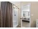 Bathroom view into the main bedroom highlighting the shower stall, and providing convenience and privacy at 182 Tibton Circle, Myrtle Beach, SC 29588