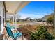 Inviting front porch with seating, offering a relaxing outdoor space and neighborhood view at 182 Tibton Circle, Myrtle Beach, SC 29588