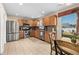 Bright kitchen with stainless steel appliances, wood cabinets, and backyard access at 182 Tibton Circle, Myrtle Beach, SC 29588