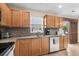 Functional kitchen featuring ample cabinet space, tile backsplash, and a modern design at 182 Tibton Circle, Myrtle Beach, SC 29588