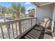 Balcony with scenic views overlooking landscaping and a pond at 1891 Colony Dr. # 15-G, Surfside Beach, SC 29575