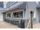 Exterior shot of a charming tiki bar with barstool seating and inviting decor at 2001 S Ocean Blvd. # 209, Myrtle Beach, SC 29577