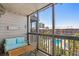 Relaxing screened porch with outdoor furniture and views of the complex pool at 207 3Rd Ave. N # 348, North Myrtle Beach, SC 29582