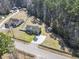 Aerial view of home with a large yard, shed, and wooded surroundings at 2192 Bell Rd., Longs, SC 29568